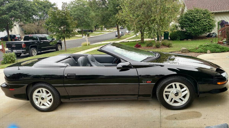 Illustration for article titled For $8,500, Could This 1995 Chevy Camaro Z28 Droptop Put You Back In Black?